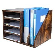 a wooden shelf with two books and files in it