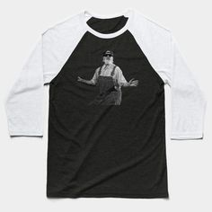 a black and white shirt with an image of a man in overalls holding his hands out