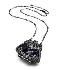 VICTORIAN Black Enamel Smoky Crystals Purse Locket Pendant 22" Chain Necklace VICTORIAN Black Enamel Smoky Crystals Purse Locket Pendant 22" Chain Necklace Click images to enlarge Description UNIQUE Black Lacquer Enamel Smoky Gray Black Crystals Purse Bag Locket Pendant 22" Antique Chain Long Necklace     Victorian Elegance!  This gorgeous unique victorian style necklace features a black lacquer enamel smoky gray & black crystals encrusted antique metal purse bag locket pendant on 22" antique me Antique Black Nickel-free Necklace, Handmade Black Enamel Necklace, Silver Enamel Jewelry For Evening, Victorian Black Enamel Necklace For Gift, Black Enamel Party Jewelry, Black Metal Collectible Necklaces, Black Metal Necklace With Locket, Gothic Locket, Victorian Elegance