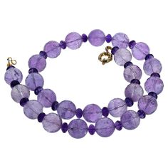 These highly polished sparkling natural real Amethyst gems are enhanced with intensely colored Amethyst gems as spacers. The large gemstones are approximately 16 mm and the beautiful spacer Amethysts are approximately 8 1/2mm. The spacer gemstones glitter naturally and intensely. The clasp is a gold plated. 1st Dibs, Amethyst Gem, Designer Jewelry, Myanmar, Gold Plate, Amethyst, Jewelry Design, Beaded Necklace, Jewelry Necklaces