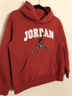 2000s Michael Jordan Jumpman Nike Hoodie, Red Youth Large. Condition is "Pre-owned". Shipped with USPS Priority Mail. A few spots on back, otherwise very clean! Nike Hoodie With Letter Print, Nike Hooded Hoodie For Sports Season, Nike Hoodie With Logo Print For Fall, Nike Long Sleeve Hoodie With Logo Print, Nike Hooded Hoodie, Nike Cotton Hoodie With Letter Print, Red Hoodie With Logo Print And Crew Neck, Red Logo Print Sweatshirt For Fall, Red Crew Neck Hoodie With Logo Print