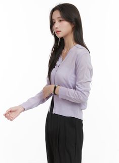 Product Detail Style : Casual, Minimal Occasion : Work wear Detail : Buttoned, See-through Print : Solid Material : Acrylic, Knit Sleeve : Long sleeve Neck : V neck Acrylic100 Color : Purple, Black, White Made in Korea Model Size Model is wearing size S/M and the color Purple. Height : 5'5" | 164cm / Top : XS / Bottom : S (25 inch) .prddescription table, .prddescription td, .prddescription th { border : 1px solid black; border-collapse : collapse; padding: 10px; } Size(Inch) Size Shoulder Bust S Elegant Stretch V-neck Cardigan, Spring Fine Knit Cardigan, Fine Knit Cardigan For Work In Spring, Elegant Solid V-neck Sweater For Spring, Spring Sweater For Layering, Versatile Long Sleeve Fine Knit Cardigan, Stretch Fine Knit Long Sleeve Cardigan, Fitted Fine Knit V-neck Sweater, Fitted V-neck Sweater For Spring Layering