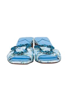 Something blue meets cottage core in these Sophia Webster x LoveShackFancy mules. The blue and ivory floral print adds a touch of whimsy, while the jeweled toe detail adds a touch of elegance. Perfect for a bride-to-be looking for a unique wedding shoe option. Size 8.5 (IT 38.5) Fabric upper Metallic lining Jeweled toe detail Open toe Slip on Comes with dust bag Heel height 2.5" Designer Floral Print Heels For Spring, Summer Blue Floral Print Heels, Blue Heels With Floral Print And Round Toe, Blue Floral Print Heels With Round Toe, Designer Blue Heels For Spring, Blue Floral Print Open Toe Heels, Unique Wedding Shoes, Sophia Webster Shoes, Mule Heel