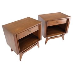 two wooden nightstands with one open and the other closed