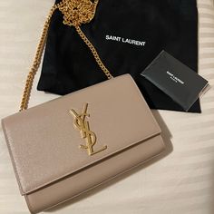 Authentic Ysl Kate Small In The Color Dark Beige. This Beautiful Date Night/Casual Occasion Purse Is In Brand New Condition!!! No Scratches Or Damages. Wore 3-4 Times Since Bought Within In A Few Months Ago. It Has A Gold Chain And Comes With A Dust Bag. Please Feel Free To Message Me With Any Inquiries Regarding The Bag :) Ysl Kate Bag Beige, Ysl Kate Suede Bag, Ysl Kate Small Silver, Yves Saint Laurent Bag Beige, Ysl Kate, Beige Bag, Yves Saint Laurent Bags, Saint Laurent Paris, Dark Beige