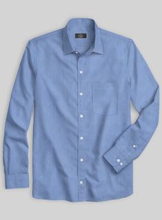 Adapt a classic style with much more reliability with our Italian Lombardo Cool Blue Pinstripe Shirt, which has an explicit elegance for your day. Tailored with pure cotton fabric, our shirt has a very soft and smooth texture, with white stripes covering a blue canvas. Plus, it offers a luxe twist for your casual wear and gives your closet a solid and robust makeover. So be a prime focus that will undoubtedly become a favorable piece for every occasion forth.  Made according to your measurements Striped Cotton Dress Shirt For Semi-formal Occasions, Semi-formal Pinstripe Button-up Shirt, Classic Pinstripe Cotton Top, Formal Striped Shirt With Spread Collar, Elegant Vertical Stripe Shirt For Business Casual, Elegant Business Casual Shirt With Vertical Stripes, Elegant Blue Shirt With Vertical Stripes, Classic Striped Dress Shirt For Business, Pinstripe Business Shirt With Spread Collar