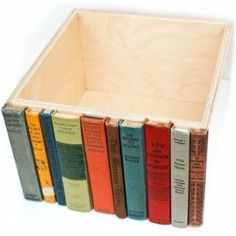 a wooden box filled with lots of books