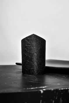 a black object sitting on top of a table