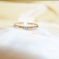 "Materials Gold, Rose gold, White gold Gemstone: Natural Emerald and diamond 14k Gold Art Deco Emerald And Diamond Ring / Wedding Ring / Stackable Emerald Ring / Diamond Stacking Ring / Solid Gold Ring / Wedding Ring Item Details ✔ Made to Order ✔ Gold Kt: 14K (also available in 18K) ✔ Available Gold Color: Rose Gold, Yellow Gold, White Gold ✔ Total Diamond ctw: 0.06 Ctw ✔ Total emerald ctw: 0.03 Ctw ✔ Diamond Color-Clarity: j Color SI Clarity ✔ Width of Band: 1.4MM ✔ Ready to Ship in 7-10 Busin 14k Rose Gold Jewelry With Diamond Accents, 14k Rose Gold Round Band With Diamond Accents, Anniversary Birthstone Ring In Rose Gold With Diamond Accents, Rose Cut Diamond Promise Ring For May Birthstone, Anniversary Ring With Rose Cut Diamonds And May Birthstone, Rose Gold Emerald Jewelry For Anniversary, Anniversary Rose Gold Birthstone Ring With Diamond Accents, Anniversary Rose Gold Emerald Jewelry, Gold Emerald Stackable Wedding Rings