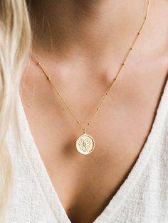 Our gold zodiac coin necklace might be our new favorite necklace. 14k gold filled - perfect for everyday wear. Get your own sign, or wear your loved one's sign!   Find dainty necklaces, hoop earrings, dainty gold stacking rings, and more at Simple & Dainty! Yellow Gold Zodiac Sign Coin Necklace As Gift, Zodiac Sign Medallion Necklaces For Gifts, Zodiac Sign Medallion Necklace For Gifting, Zodiac Sign Medallion Necklace Gift, Dainty Zodiac Sign Necklace For Gift, Medallion Zodiac Sign Necklace For Gifts, Zodiac Sign Medallion Jewelry Gift, Dainty Zodiac Sign Pendant Necklace, Minimalist Zodiac Sign Necklace Gift