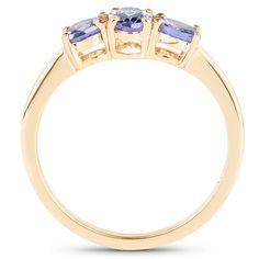 "Tanzanite Ring, Natural 3-Stone Tanzanite Sterling Silver Ring with 18K Yellow Gold Plating, for Women, December Birthstone Flaunt yourself with this tanzanite 3 stone ring. The natural gemstones have a combined weight of 0.90 carats and are set in .925 sterling silver with 18K yellow gold plating. The soft violet hue of this ring adds a pop of color to any look! The understated design and vibrant stones makes this ring perfect for every occasion. Product Details: Metal: .925 Sterling Silver Su Fine Jewelry Tanzanite Three Stone, Anniversary Three-stone Tanzanite Jewelry, Tanzanite Three-stone Round Jewelry, Three-stone Round Tanzanite Jewelry, Three Stone Round Tanzanite Jewelry, Three Stone Tanzanite Round Ring, Tanzanite Three-stone Ring For Anniversary, Tanzanite Three Stone Rings For Anniversary, Tanzanite Three Stone Rings As A Gift