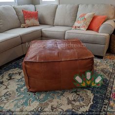 a couch and ottoman in a living room