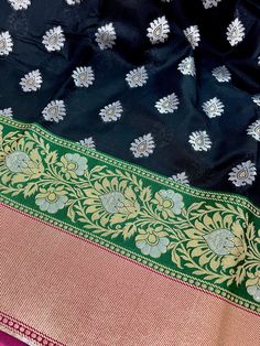 Transform your wardrobe with our exquisite Black and Pink color combination Banarasi Silk Saree with Sliver buttas. It has double border with Green which has floral pattern with meenakari while the bottom border has simple green pattern. Saree is very soft with intricate zari work, this traditional Indian sari is perfect for special occasions such as weddings, festivals, and ceremonial events. Item : SareeColor : Black and GreenBase Fabric : Banarasi Silk Blouse piece : Comes with Blouse pieceBl Black Dupatta With Border In Traditional Drape, Black Dupatta With Border, Black Paithani Silk Dupatta With Self Design, Black Dupatta With Border For Wedding, Black Diwali Saree With Border, Bollywood Style Black Saree With Border, Festive Black Traditional Wear With Border, Black Wedding Dupatta With Border, Black Art Silk Dupatta With Border