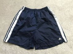 ITEM IS IN PRE OWNED GOOD USED CONDITION. NICE CLASSIC COLORWAY AND LOGO CHECK PHOTOS FOR MEASUREMENTS AND A SURE FIT. PRE OWNED ITEMS CAN VARY IN SIZE. PLEASE CHECK OUT OUR OTHER LISTINGS! WE RESPOND TO QUESTIONS AS SOON AS POSSIBLE. WE POST DAILY!  WE SHIP DAILY! Casual Three Stripes Shorts For Sports Events, Adidas Casual Shorts For Sports Events, Casual Adidas Shorts For Sports Events, Adidas Blue Shorts For The Gym, Adidas Blue Shorts For Gym, Adidas Blue Gym Shorts, Adidas Athletic Shorts For Gym With Three Stripes Branding, Adidas Moisture-wicking Shorts For Streetwear, Adidas Casual Athletic Shorts For Jogging