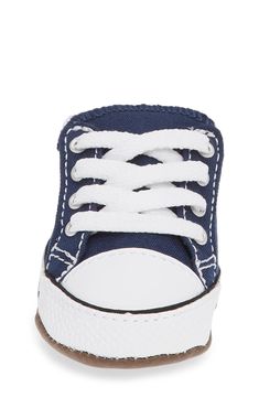 A hook-and-loop top flap kicks up the appeal of a sporty low-top crib shoe made of soft canvas with a plush interior and a flexible, wiggle-friendly sole. Sits on a wide, flat base to help promote balance and confident early steps for beginning walkers Hook-and-loop flap closure Removable EVA-cushioned insole Textile upper, lining and sole Imported Crib Shoe, Baby Style, Crib Shoes, Converse Chuck Taylor All Star, Chuck Taylor Sneakers, Ivory White, Chuck Taylor All Star, Converse Chuck, Chuck Taylor