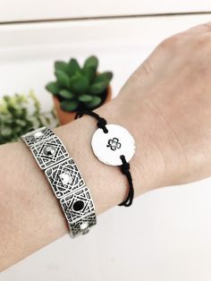 "This listing is for a boho style hand-stamped Four Leaf Clover charm with hammered edges on an adjustable hemp cord and that makes a great layering or stand-alone bracelet or anklet. Dainty and lightweight, designed for everyday wear. The bracelet comes with an inspirational card with the Four Leaf Clover Quote- \"Legend has it that each leaf on a four-leaf clover has its own meaning; the first is hope, the second for faith, the third is love and the fourth, if you can find one, is for luck!\" Clover Quote, Clover Jewelry, Custom Bookmarks, Retirement Gifts For Women, 4 Leaf Clover, Clover Charm, Irish Blessing, Hemp Cord, Luck Charm