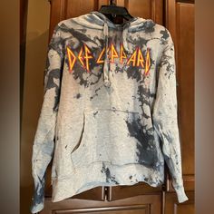 Grey Hand Tie Dyed Def Leppard Hoodie. Never Worn Acid Wash Grunge Hoodie For Fall, Hooded Bleached Sweatshirt For Fall, Bleached Hoodie For Fall Streetwear, Winter Long Sleeve Bleached Hoodie, Acid Wash Bleached Hoodie For Fall, Fall Acid Wash Bleached Hoodie, Def Leppard, Forever 21 Tops, Tie Dyed