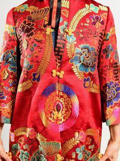 "Chinese Brocade Jacket/ Chinese Embroidered Opera Coat/ Chinese Embroidered Jacket/ Red Satin Jacket/ 60's Chinese Coat/ Size S-M Incredible satin Chinese jacket in the most vibrant hues. Bold red with multi-colored embroidery accentuated by yellow frog closures. In excellent condition. A collector's item. Fully lined. Size tag reads size 10. Model is 5'4\" and a size 4 for scale. Please see exact measurements below. Item measured while flat, double where applicable, i.e. waist, hips. Shoulder Traditional Red Outerwear With Stand Collar, Vintage Red Embroidered Outerwear, Vintage Red Outerwear With Stand Collar, Traditional Red Outerwear With Floral Embroidery, Red Vintage Outerwear With Floral Embroidery, Vintage Red Outerwear With Floral Embroidery, Chinese Jacket, Chinese Brocade, Greek Goddess Dress