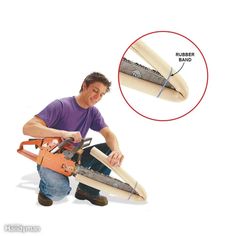 a man is working on something with a hand saw