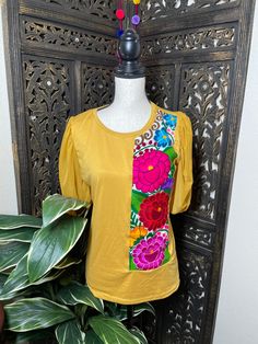 "Trendy Floral Embroidered Blouse - Artisan Made Embroidered Blouse - Chiapas, Mexico Beautiful hand embroidered blouse! This has been made and brought directly from Chiapas, Mexico. The blouse has extremely detailed embroidery. The embroidery is 100% handcrafted. All the work on this blouse has a professional skilled finish and the multicolor embroidered makes it look even more eye catching. The embroidery work is made with great quality thread. The eye catching will be on the embroidered work, Traditional Multicolor Embroidered Top With Embroidered Sleeves, Yellow Embroidered Short Sleeve Blouse, Yellow Cotton Tops With Resham Embroidery, Festive Yellow Top With Floral Embroidery, Festive Yellow Floral Embroidered Top, Festive Yellow Floral Embroidery Tops, Yellow Floral Embroidered Folk Top, Yellow Folk Top With Floral Embroidery, Yellow Folk Style Top With Floral Embroidery