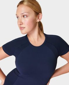 A versatile workout t-shirt made for every sport. Lightweight and sweat-wicking fabric. Seamless and high-stretch for all workouts. New and improved slim fit with breathable mesh in high sweat areas. Length 62cm / 24.5" from shoulder. Model wears size S and is 178cm/5'10" tall. Style Code: SB6546Colour: Navy Blue High Stretch Go-dry T-shirt For Gym, Compressive Sportswear T-shirt For Workout, Athleisure Compression T-shirt, Breathable, Athletic Fit Sportswear T-shirt For Yoga, Fitted Athleisure T-shirt For Training, Solid Compressive Athleisure T-shirt, Stretch Crew Neck T-shirt For Workout, Compressive Solid T-shirt For Sports, Compression Workout T-shirt, Breathable