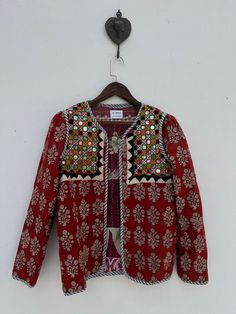 Repurposed kantha jacket with tribal mirrorwork patch Kantha Jacket Outfit, Festive Outerwear With Woven Motifs, Red Folk Cotton Outerwear, Cotton Patchwork Outerwear For Festivals, Festival Cotton Outerwear With Patchwork, Festival Cotton Patchwork Outerwear, Traditional Multicolor Block Print Outerwear, Fitted Cotton Outerwear For Festivals, Folk Style Patchwork Outerwear For Festivals