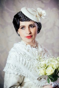 This is an exquisite, vintage inspired ivory bridal pillbox hat with hand-made felt flower, freshwater pearls and birdcage veil. The hat is hand blocked from luxurious rabbit fur felt using traditional millinery techniques. Rabbit fur felt has a soft, velvet-like texture, perfect for a wedding headpiece. Everything in this hat is hand cut, blocked, shaped and stitched. I have created a gorgeous felt flower to trim this extraordinary hat. The flower is embellished with freshwater pearls and seed Ivory Pillbox Hat, Veil Fascinator, Evening Hat, Hat Veil, Bridal Birdcage Veils, 50s Wedding, Bridal Hair Veil, Ivory Veil, Bridal Fascinator