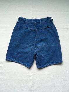 "1960s women's jean shorts Wrangler, made in USA snap top SCOVILL zipper denim cotton 2 front pockets 6 belt loops worn in to perfection denim has specks and lined patina pictures seem a bit dark measures, lying flat, waist- 12\" to 12 1/2\" (with a tug_ rise-12\" hip at bottom of J seam-18 1/2\" inseam-5 1/2\" hem-9 1/2\" out seam-16 1/2\"" Wrangler Black, Cocktail Dress Vintage, High Waist Denim, Jeans For Short Women, Blue Jean Shorts, Long Sweaters Cardigan, Denim Cotton, Levis Denim, Summer 24