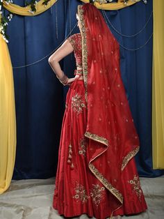 This gorgeous red raw silk bridal lehenga with zardosi and sequins work butti is teamed with a red heavy cutwork blouse. This outfit is completed with a red organza embroidered dupatta.
*Ready to ship in sizes XS, S, M, L Red Kundan Lehenga With Dupatta, Organza Lehenga With Intricate Embroidery For Traditional Ceremonies, Organza Lehenga With Dupatta For Traditional Ceremonies, Red Kundan Sets With Dupatta, Red Gown With Resham Embroidery For Diwali, Traditional Red Gown With Dupatta, Red Gown With Intricate Embroidery And Traditional Drape, Red Lehenga With Intricate Embroidery In Chinon, Red Chanderi Lehenga With Intricate Embroidery