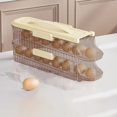 an egg carrier with eggs in it sitting on a counter