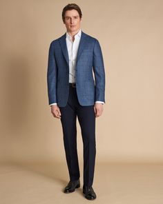 95% wool, 5% silk, Available in slim fit only, Patch pockets with chest pocket, Single breasted two-button fastening, AMF stitching along collar, notch lapel and patch pockets, Four-button working cuff with corozo nut buttons, Lighter shoulder pad for a natural silhouette, Body Lining: Exclusive Charles Tyrwhitt Lapwing 55% polyester, 45% viscose lining, Double back vent, Dry clean only - Wool Silk Check Jacket - Ocean Blue | Men's Charles Tyrwhitt Silk Checkered Jacket - Ocean Blue Size 36R Woo Tailored Sport Coat For Business Casual, Timeless Fitted Tweed Jacket With Pockets, Business Casual Long Sleeve Suits With Pockets, Business Casual Fitted Tweed Jacket With Pressed Crease, Custom Fit Wool Outerwear With Welt Pockets, Business Casual Blazer With Notch Lapel And Welt Pockets, Blue Sport Coat With Lapel Collar For Office, Semi-formal Tweed Jacket With Welt Pockets, Blue Tweed Jacket With Pockets For Business Casual