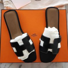 Herms Oran Slides Black Leather Size 36 Condition: Like New (Worn Twice) - Minor Wear At Bottom Soles Authenticated By Poshmark Sold With Original Herms Box, Dust Bag, And Receipt. Hermes Oran Sandals, Hermes Shoes, Hermes Oran, Hermes Box, Women's Shoes Sandals, Slides, Shoes Sandals, Dust Bag, Black Leather