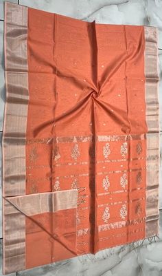 *It's a beautiful  Maheshwari Handwoven big motif saree. *100% Handloom : comes with India Handloom Mark *Washing Method : Dry Clean Recommended *Weave Type: Maheshwari *Material: Half Silk & Half Cotton *Length: Saree: 5.5 metres *Blouse Piece: 0.80 metres *Width : 46 Inches* Please note - color may be vary a little due to sunlight and photography . Please message us after purchasing in case you want fall and Pico done it not . No extra charges for fall and Pico but inform us . Blouse stitching Orange Cotton Silk Dupatta With Cutdana, Orange Tussar Silk Festive Saree, Orange Tussar Silk Saree For Festive Occasion, Festive Orange Tussar Silk Saree, Orange Handloom Art Silk Pre-draped Saree, Orange Handloom Pre-draped Saree, Orange Tussar Silk Saree With Zari Weaving, Traditional Orange Tussar Silk Saree, Traditional Drape Orange Tussar Silk Saree