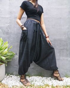 "The harem style trousers made from cotton fabric 100%with an elasticated smock waist and ankles they provide a comfortable lightweight fit, perfect for casual wear, festivals, yoga, holidays as well as pairing with a plain top to get that popular look. D I S C O U N T & P R O M O T I O N ❤ Buy 2 or more items, get 10% off ❤ Buy 4 or more items, get 15% off ENTER the coupon code: IYARA015 ❤ Buy 6 or more items, get 15% off ENTER the coupon code: IYARA020 PLEASE NOTE I can not apply a discoun Ankle-length Relaxed Fit Harem Pants, Spring Cotton Drop Crotch Harem Pants, Casual Harem Pants For Festivals, Casual Festival Harem Pants, Black Ankle-length Cotton Harem Pants, Baggy Hippie Harem Pants With Pockets, Black Baggy Ankle-length Harem Pants, Baggy Cotton Harem Pants Ankle-length, Baggy Cotton Ankle-length Harem Pants