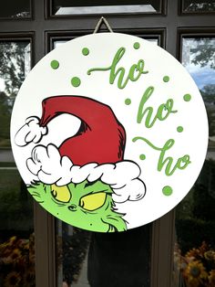 a sign that says, ho ho ho on the front of a door with an image of dr seuss