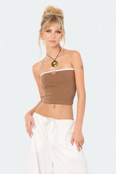 Brown Bandeau Tube Top For Spring, Spring Brown Bandeau Tube Top, Trendy Stretch Brown Halter Top, Brown Stretch Tube Top For Spring, Spring Brown Stretch Tube Top, Brown Strapless Crop Top, Fitted Brown Tube Top For Spring, Strapless Brown Summer Tops, Brown Fitted Casual Tube Top