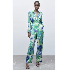 New With Tags Zara Floral Print Long Sleeved Multicolored Jumpsuit| 8676/274/330 Size Xs Lapel Collar Surplice V-Neckline Long Sleeves Shoulder Pads Straight Leg Front Zip And Golden Button Closure Side Slant Pockets 100% Polyester Approximate Measurements: Armpit To Armpit - 18” Waist - 13” Rise - 11.5” Inseam - 30” Length - 57.5” Leg Opening -9.25” 19-000 Casual Green Long Sleeve Pantsuit, Chic Green Pantsuit For Spring, Multicolor Jumpsuits And Rompers For Spring Workwear, Floral Print Jumpsuits And Rompers For Spring Workwear, Chic Summer Long Sleeve Pantsuit, Chic Summer Pantsuit With Long Sleeves, Chic Long Sleeve Summer Pantsuit, Casual Green Pantsuit For Spring, Spring Casual V-neck Pantsuit