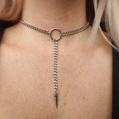 Stunning trendy yet sophisticated O ring chain choker with spike pendant! Made from stainless steel so will not tarnish or discolour. Available in 2 sizes: Small (shown in photographs) Measures 12.5 inches (choker part)+ 3 inch extension chain  Medium  Measures 14.5 inches (choker part)+ 3 inch extension chain  Width of chain: 5mm O ring measures 18mm Spike pendant measures 18mm Please don't hesitate to contact me if you would like a larger size. 💕 You will receive this necklace gift wrapped re Punk Style Stainless Steel Metal Ring Jewelry, Punk Stainless Steel Jewelry With Metal Ring, Edgy Choker With Adjustable Chain, Punk Style Stainless Steel Clavicle Chain Jewelry, Punk Stainless Steel Clavicle Chain Jewelry, Punk Jewelry With Adjustable Stainless Steel Chain, Punk Style Stainless Steel Jewelry With Adjustable Chain, Punk Stainless Steel Jewelry With Adjustable Chain, Edgy Adjustable Chain Necklace