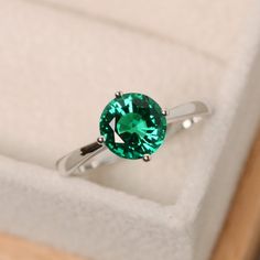 Green Solitaire Sterling Silver Ring, Green Sterling Silver Solitaire Ring, Green Sterling Silver Rings With Prong Setting, Emerald Ring With Vvs Clarity Round Cut, Emerald Cubic Zirconia Ring With Diamond Cut, Cubic Zirconia Emerald Ring With Diamond Cut, Green Topaz Ring With Diamond Accent, Green Diamond Topaz Ring, Green Solitaire Crystal Ring In Sterling Silver