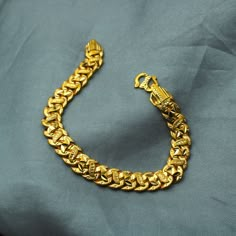 "Beautiful yellow gold bracelet Gold Purity- 22k yellow Gold Length - 8\" inches approx Width - 1 cm Weight- 15.14 grams approx" Gold Cuban Link Bracelet Gift, Gold Cuban Link Chain Bracelet For Anniversary, Gold Cuban Link Bracelet Hallmarked, Gold-plated Cuban Link Jubilee Bracelet, Traditional Gold-plated Chain Bracelet, Traditional Gold Plated Chain Bracelet, Boys Gold Bracelet Design, Gift Cuban Link Gold Bracelet, Gold Cuban Link Jubilee Bracelet