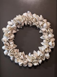 a wreath made out of rolled up books