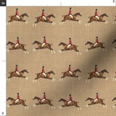 an image of a horse and rider pattern on fabric