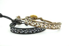 These seed bead single wraps features a stunning pattern of colored seed beads that are delicately hand woven throughout leather cords. It includes three adjustable leather closures that measure approx 15,5 cm/ 18,5 cm/ 21,5 cm These single wraps can be worn alone or layered to other single and wrap bracelets 1) Black, gunmetal and silver seed beads on black leather 2) Mat white, metalic dark gold and mat gold seed beads on kansas leather Adjustable Black Woven Friendship Bracelets, Adjustable Woven Bracelets For Everyday, Modern Adjustable Beaded Bracelets For Everyday, Modern Adjustable Beaded Bracelets For Everyday Wear, Adjustable Beaded Braided Bracelets For Everyday, Adjustable Woven Braided Bracelet For Everyday, Adjustable Beaded Leather Bracelet Gift, Adjustable Woven Wrap Bracelet As Gift, Adjustable Woven Wrap Bracelet Gift