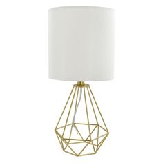 a gold metal table lamp with a white shade