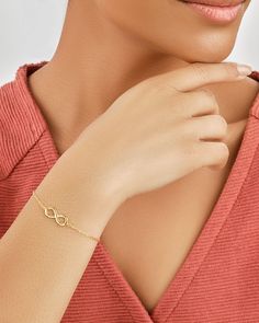 If you're looking for a delicate bracelet that you can love forever, look no further. This delicate and striking infinity bracelet is sure to be the perfect final detail, no matter what outfit you're wearing! Materials: 14K gold plated sterling silver ﻿or﻿﻿ sterling silver Features: Measures 6.5" with 1" extender, 0.75" charm, Lead & Nickel free, spring ring clasp Love Forever, Women Men Shoes, No Matter What, Gold Plated Sterling Silver, Spring Rings, Infinity Bracelet, Silver Bracelets, Delicate Bracelet, Gold Bracelet