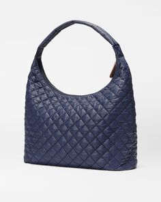 The Metro Large Shoulder bag has the same minimal silhouette as the Metro Shoulder, but with even more space to hold your essentials. Made with our signature Italian leather details and 100% recycled nylon, our trademark quilting adds a touch of texture to this classic shape. Nylon Shoulder Bag, Quilted Shoulder Bag, Mz Wallace, Lightweight Quilt, Blue Interior, Large Shoulder Bags, Zip Top, Italian Leather, Red Leather