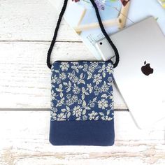 This cell phone bag has the right size for you to go shopping, to the gym or for a walk with your cell phone, ID card, keys and small things. There is a zipper on the top to keep things safe.Material: high quality canvas, cotton fabric, zipperDimension: 19.5cm x 15cm (7-3/4" x 5-7/8")Strap: 140cm (55")Inside: with cotton inner liningProduction time: about 3-4 working days (excluding holidays), shipped within two days after completion. ★other information--Kindly pls be noted that the fabric and l Casual Travel Phone Bag Portable, Square Everyday Phone Bag, Rectangular Phone Bag With Removable Pouch, Functional Phone Shoulder Bag With Cell Phone Pocket, Functional Shoulder Phone Bag With Cell Phone Pocket, Functional Rectangular Shoulder Bag With Cell Phone Pocket, Multifunctional Rectangular Shoulder Bag, Multifunctional Portable Rectangular Shoulder Bag, Portable Blue Phone Bag For Everyday Use