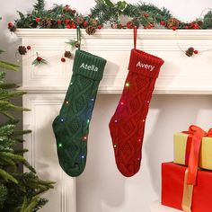 two christmas stockings hanging from a mantel