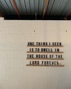 a brick wall with a quote on it that says, one thing i seek is to owll in the house of the lord forever