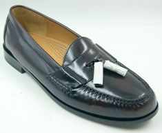 these Cole Haan Pinch Tassel Loafers. Crafted from premium burgundy leather, these dress shoes feature a round toe shape and a comfortable cushioned insole for all-day wear. The tasseled accents add a touch of sophistication to the solid pattern, making them perfect for any season – winter, summer, fall or spring. These men's shoes are ideal for any occasion, whether it's a business meeting or a formal event. The leather lining and outsole provide durability and comfort, while the Cole Haan Pinch product line guarantees quality. Available in UK Shoe Size 12.5, US Shoe Size 13, and EU Shoe Size 46, these dress shoes are a must-have for any stylish man's wardrobe. Cole Haan Tassel Loafers, Cole Haan Men, Tassel Loafers, Business Meeting, Men's Wardrobe, Season Winter, Solid Pattern, Stylish Men, Cole Haan